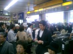 At Ueno Station there are so many people coming and going, and the Train Station attendants bark instructions at them through megaphones. I am on my way home!