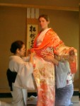 It is just as difficult for women, probably more so, but I think that women look better in a kimono! This is Juliet trying it on.